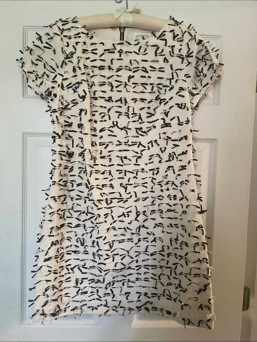 Sail to Sable Cream Mini Dress with Black Ribbon Detail